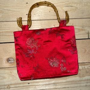 Red handbag w/ mock bamboo handles